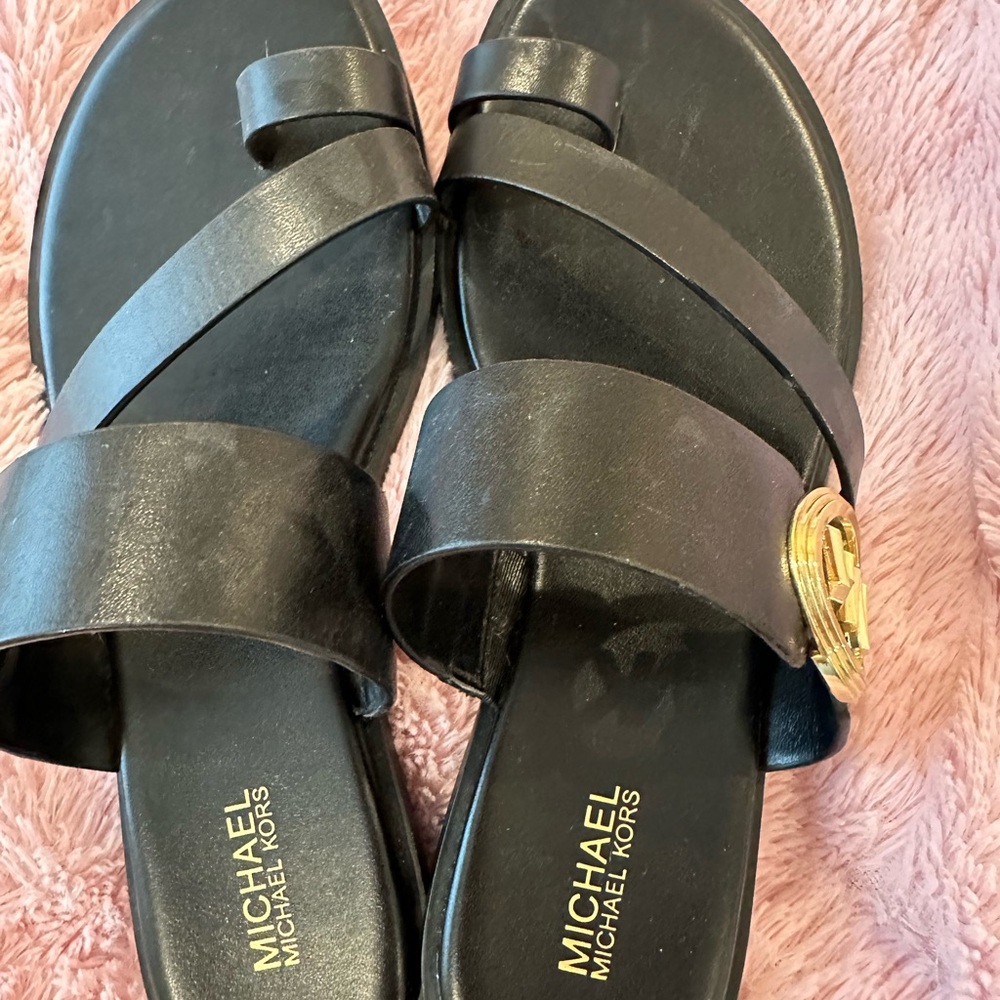 Michael Kors Black Slide Sandals Modern Minimalist Design

Floor models